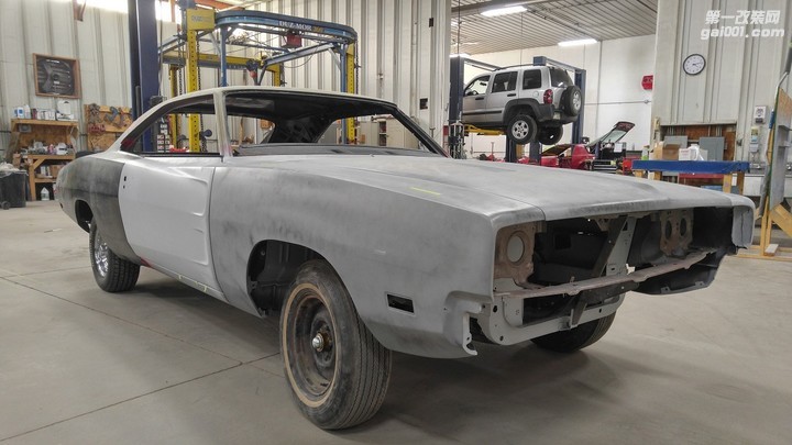 1969-dodge-charger-body-dropped-onto-challenger-hellcat-shell-in-monster-swap_16.jpg