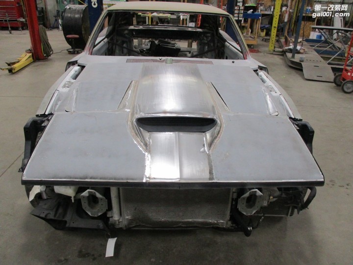 1969-dodge-charger-body-dropped-onto-challenger-hellcat-shell-in-monster-swap_35.jpg